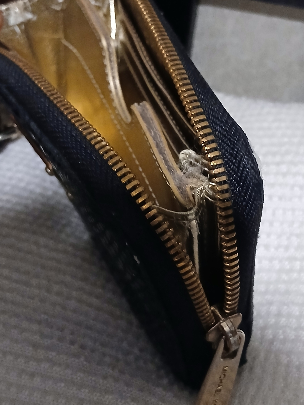 Michael Kors Black Textured Wristlet with Gold Plaque - Picture 3 of 10